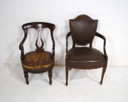 A Victorian mahogany chair, along with an antique mahogany upholstered shield back chair