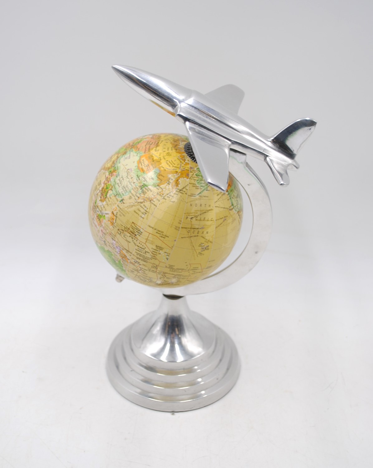 An Art Deco style globe, with chrome aeroplane finial and mounts, along with an ornamental brass - Image 2 of 4