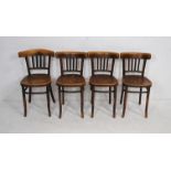 A near matched set of four bentwood chairs, marked 'Fischel' and 'Polish Bentwood Furniture