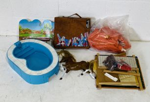 A vintage Sindy horse stable with horse and accessories, along with a Sindy swimming pool, tent