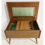 A mid century Arnold sewing box