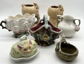 A collection of ceramics including Carlton Ware Cheshire cat butter dish, Sylvac vases, Majolica