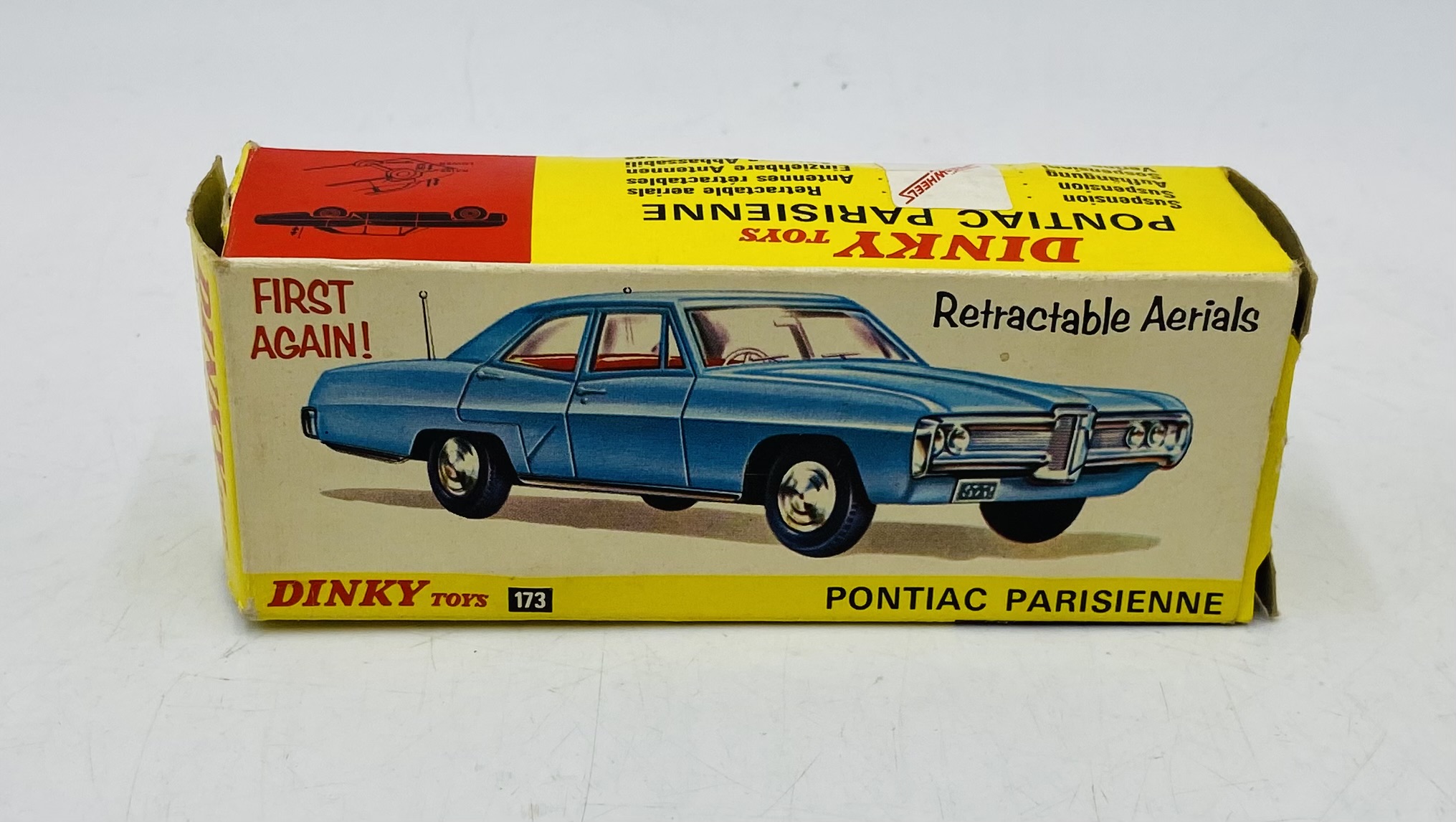 A vintage boxed Dinky Toys Pontiac Parisienne die-cast car in metallic red with a yellow interior ( - Image 5 of 7
