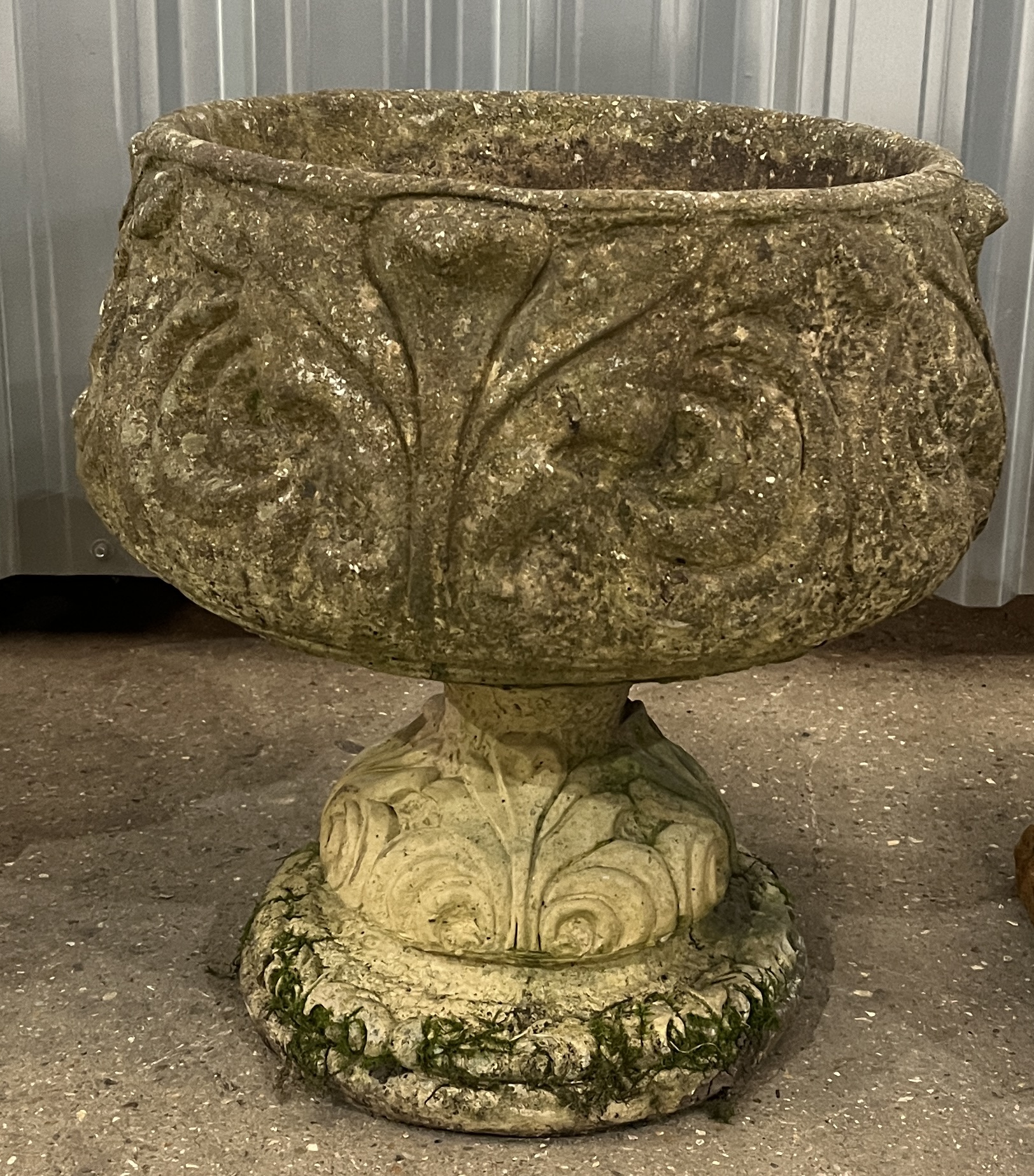 Three reconstituted stone planters including urn on stand along with a weathered terracotta planter - Image 4 of 6