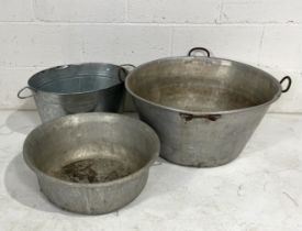 Three vintage galvanised items including a wash tub, feeder etc