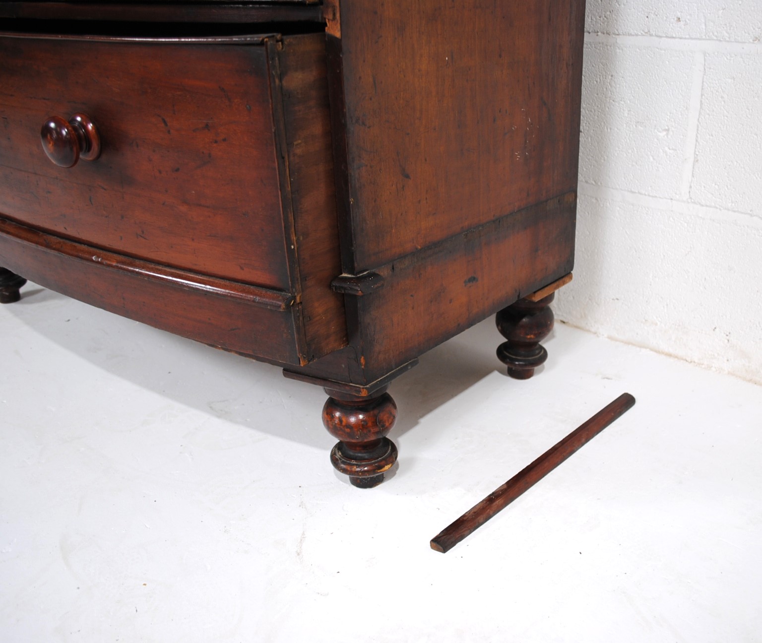 A Victorian mahogany bow-fronted chest of five drawers, raised on turned legs - one leg loose but - Image 7 of 8