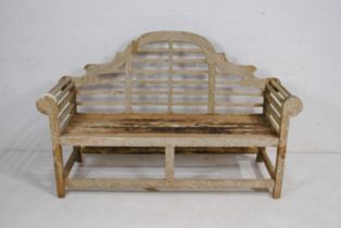 A weathered wooden Lutyens style garden bench - length 165cm
