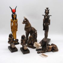 A small collection of modern resin Egyptian figures, including Isis, Bastet, Apis, Sphinx etc.