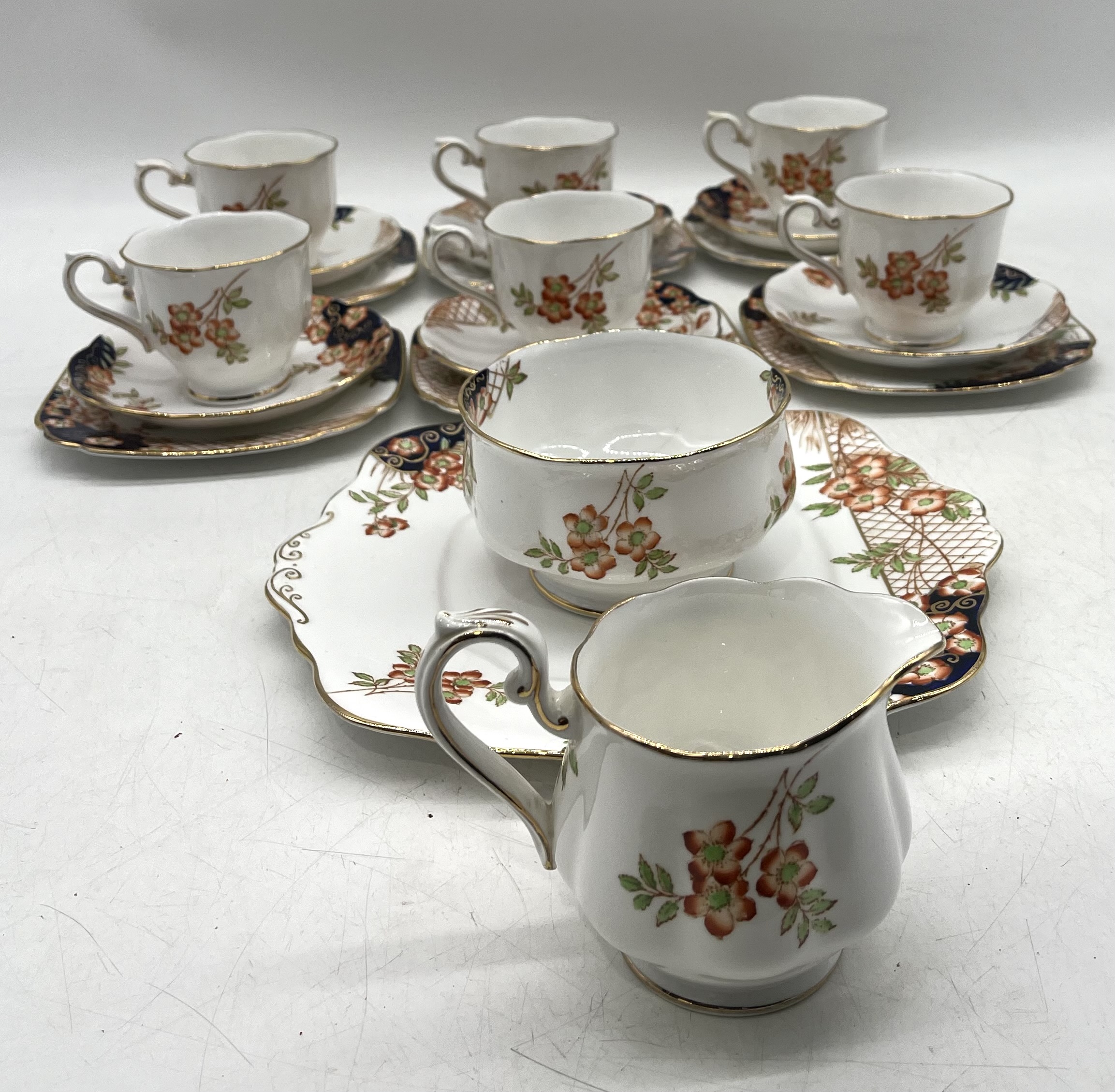 A Royal Albert Crown China tea set pattern 938015 including one sandwich plate, six trios, a milk - Image 12 of 12