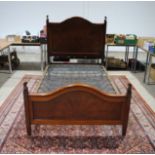 A turn of the century inlaid mahogany bed - width 122cm, depth 203cm, height 138cm