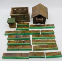 A vintage toy wooden ranch with fencing