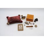 A mixed lot, including a WWI era pin cushion marked 1919, 'Book of Toasts', brass swan pin