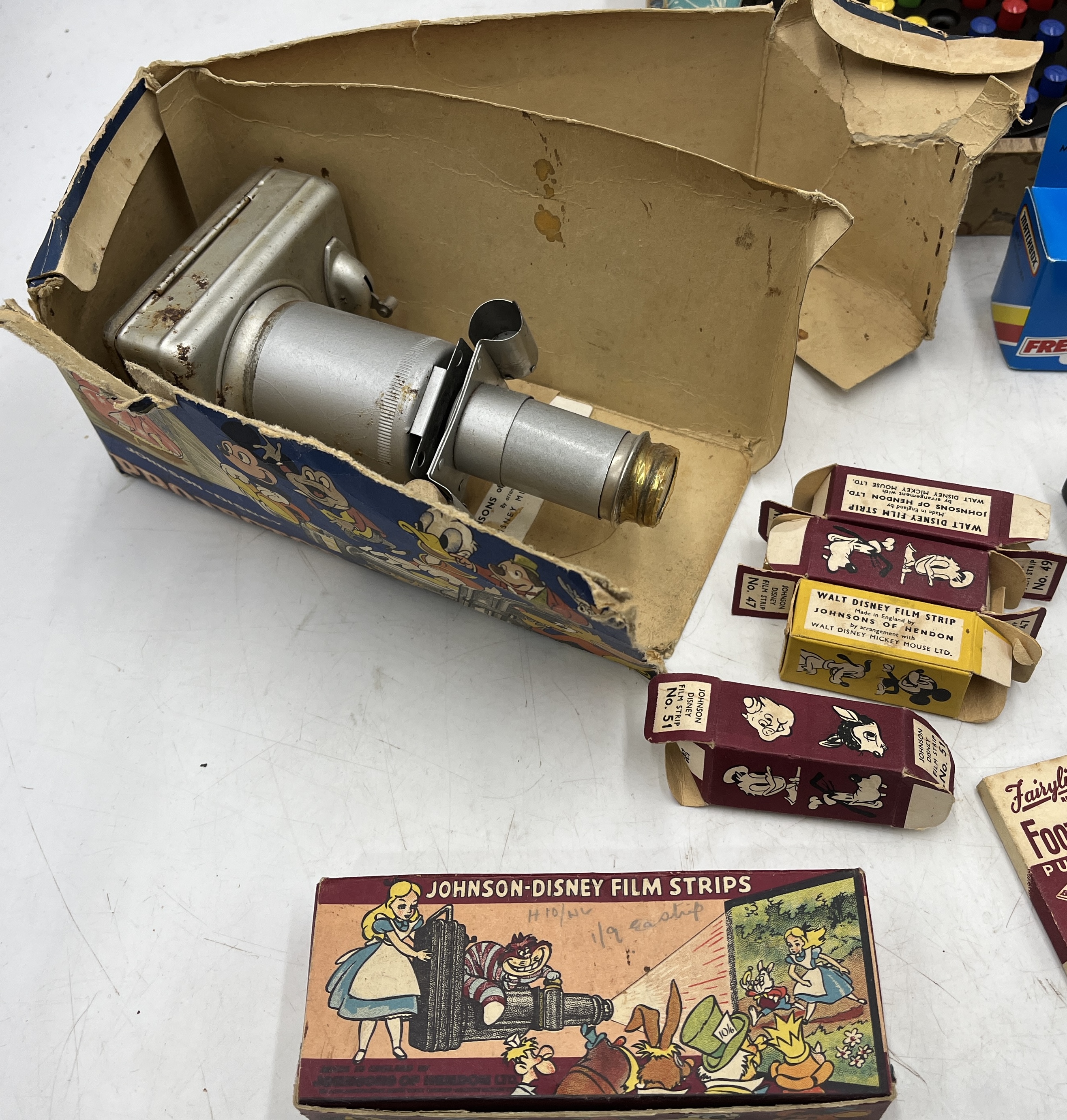 A collection of vintage toys including Johnson Disney projector, Matchbox car, solitaire etc. - Image 2 of 3