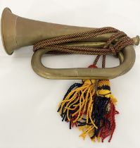 A vintage brass bugle