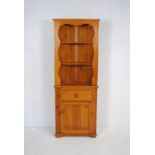 An 'Abacus' modern pine corner unit, with single drawer and cupboard under - length 68.5cm, depth