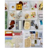 A collection of dolls house accessories including cushions, bellows, mugs, animals, rugs, cake stand