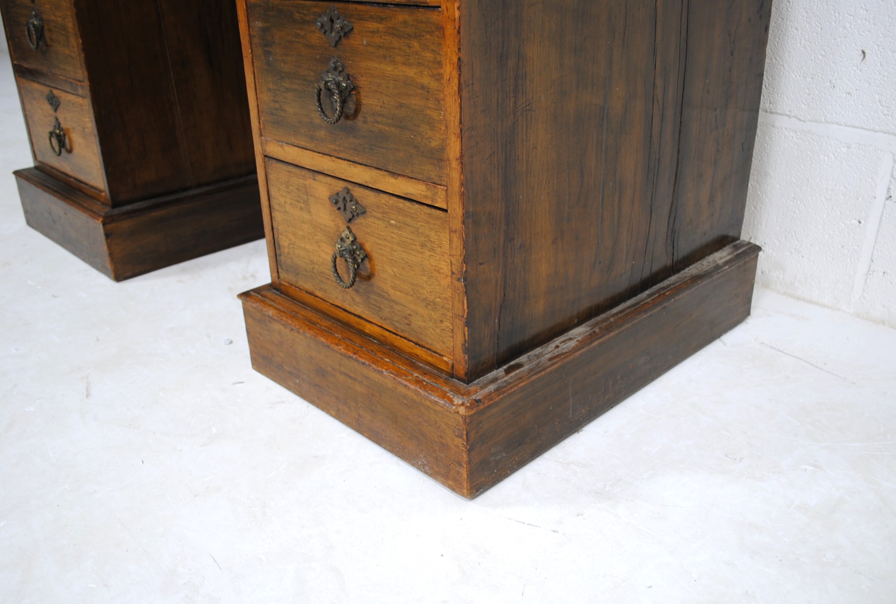 A Victorian oak kneehole writing desk, with green leather inset top and nine drawers - length 106cm, - Image 7 of 9
