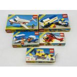 Five boxed 1980's Lego Legoland sets including Jet Airliner (6368), Airport Semi-Truck (6367), Car