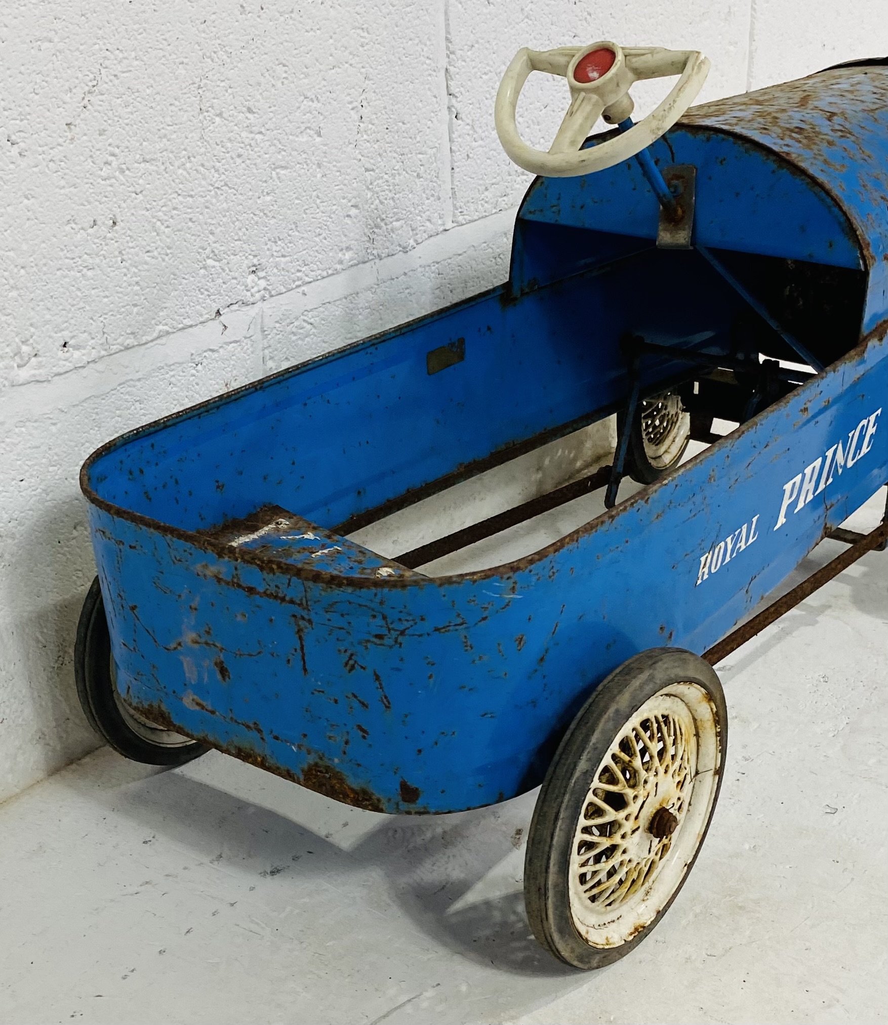 A vintage Tri-ang child's 1960s pedal car in blue, marked 'Royal Prince' to the side - steering - Image 3 of 6