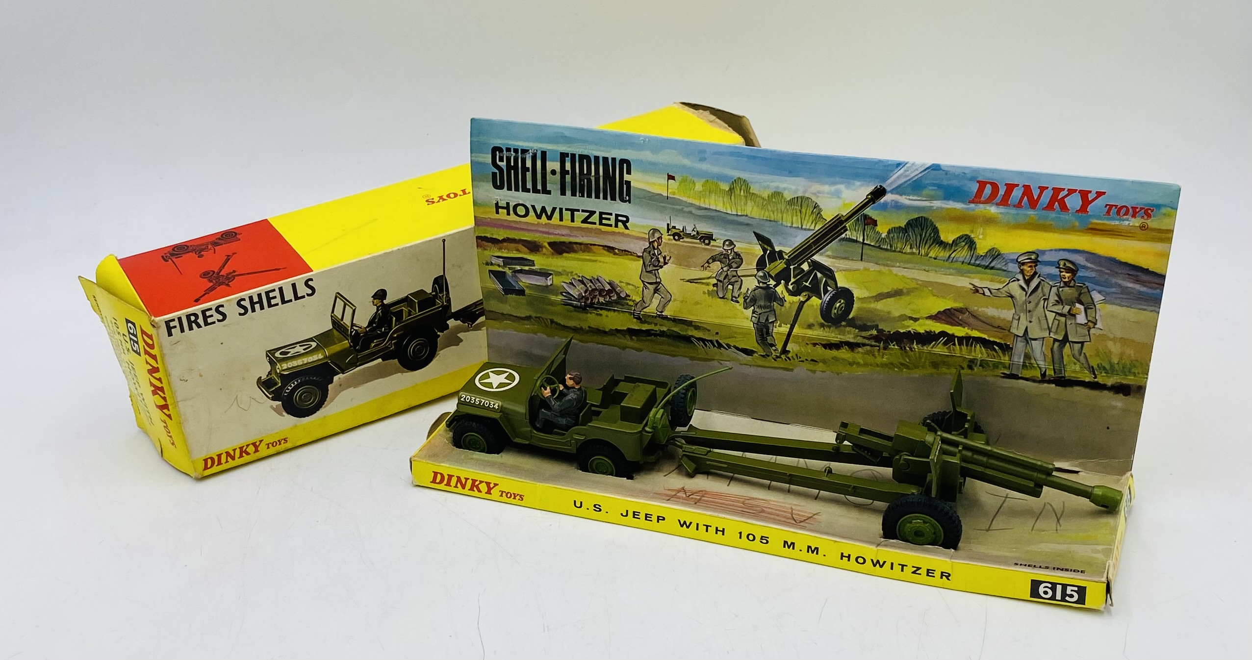 A vintage boxed Dinky Toys "U.S. Jeep with 105 MM Howitzer" with shell firing die-cast model (No