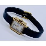 A 9ct gold ladies Bulova wristwatch on leather strap