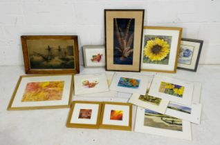 A collection of various framed and unframed pictures by local artist Kay Hicks along with a