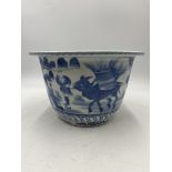An Oriental blue and white Jardiniere - approximate height 21cm, diameter 31.5cm
