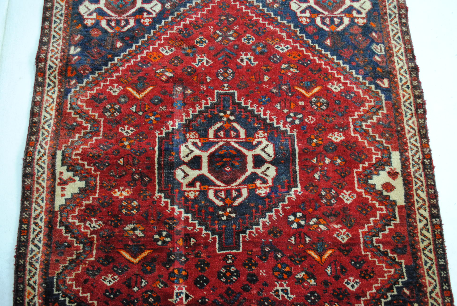 An Eastern red ground rug, with traditional designs - 173cm x 123cm - Image 5 of 8