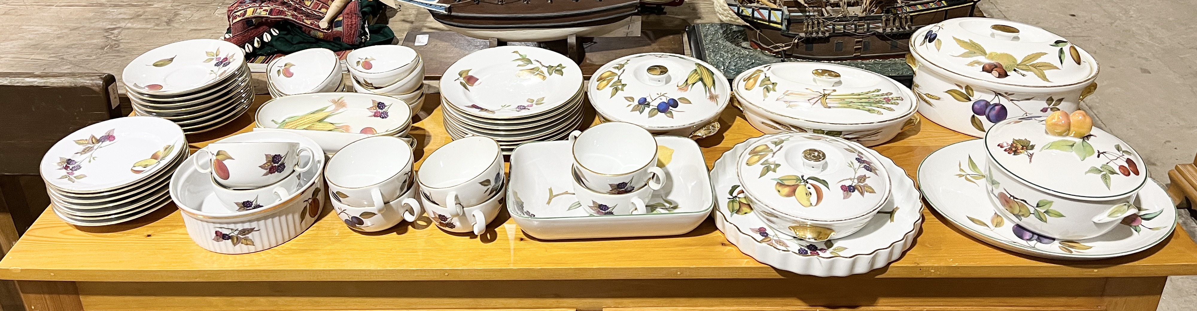 A large collection of Royal Worcester "Evesham" dinner ware including plates, bowls, terrines etc.