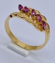 An 18ct gold ruby five stone ring, weight 2g, size P 1/2