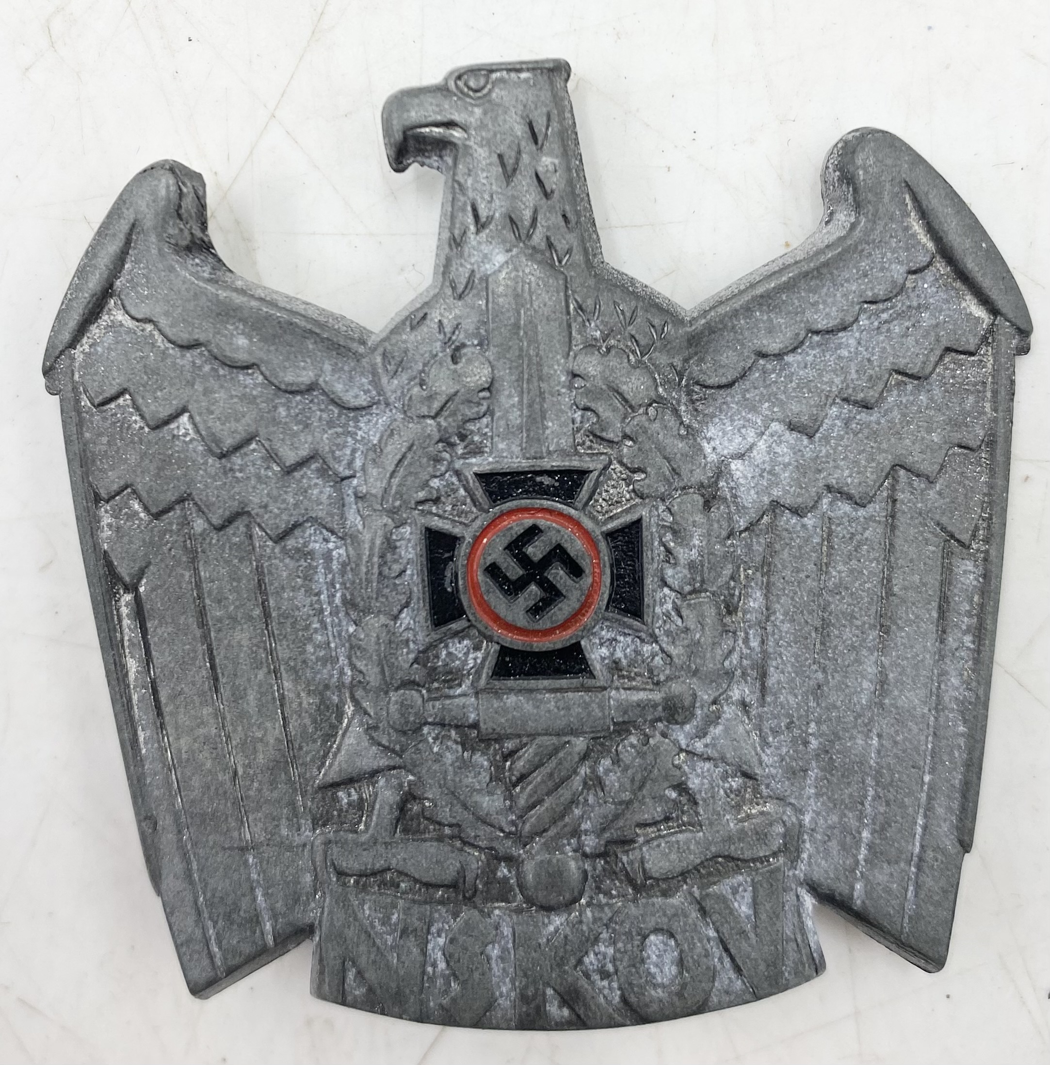 A German WWII wound badge marked to reverse 107, two DRL sports badges along with an NSKOV cap - Image 4 of 5