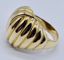 A 14ct gold ring , weight 6.9g, size M