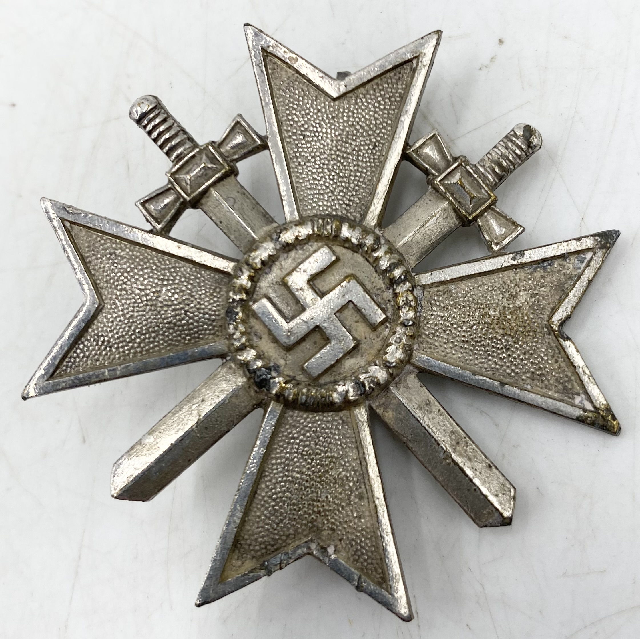 Two WWII German NSDAP party badges, a War Merit Cross 1939 (marked L15) along with a Third Reich - Image 3 of 5