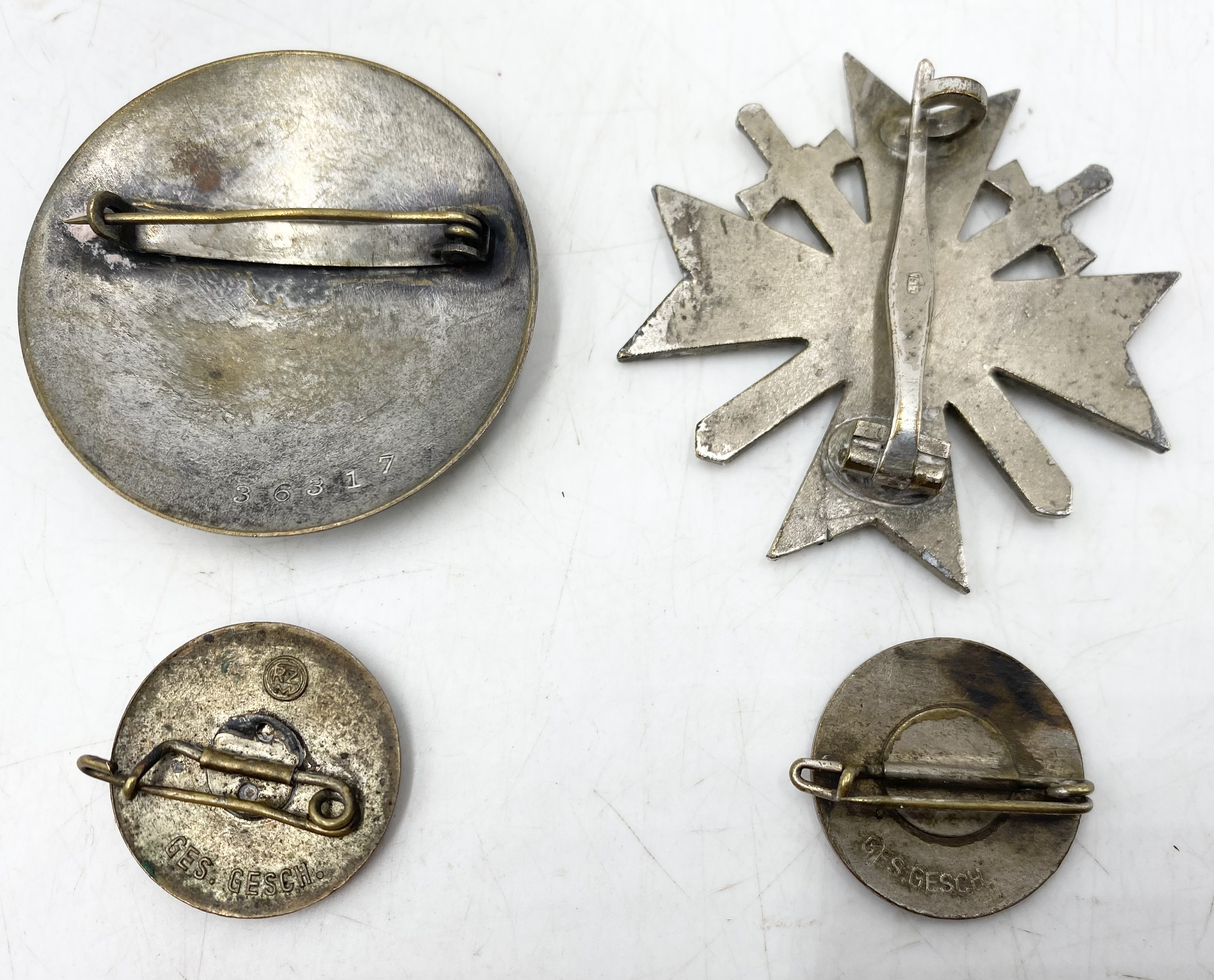 Two WWII German NSDAP party badges, a War Merit Cross 1939 (marked L15) along with a Third Reich - Image 5 of 5