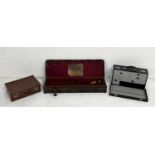 An antique Trulock Brothers, Dublin leather gun case with baize lined interior and lift out tray