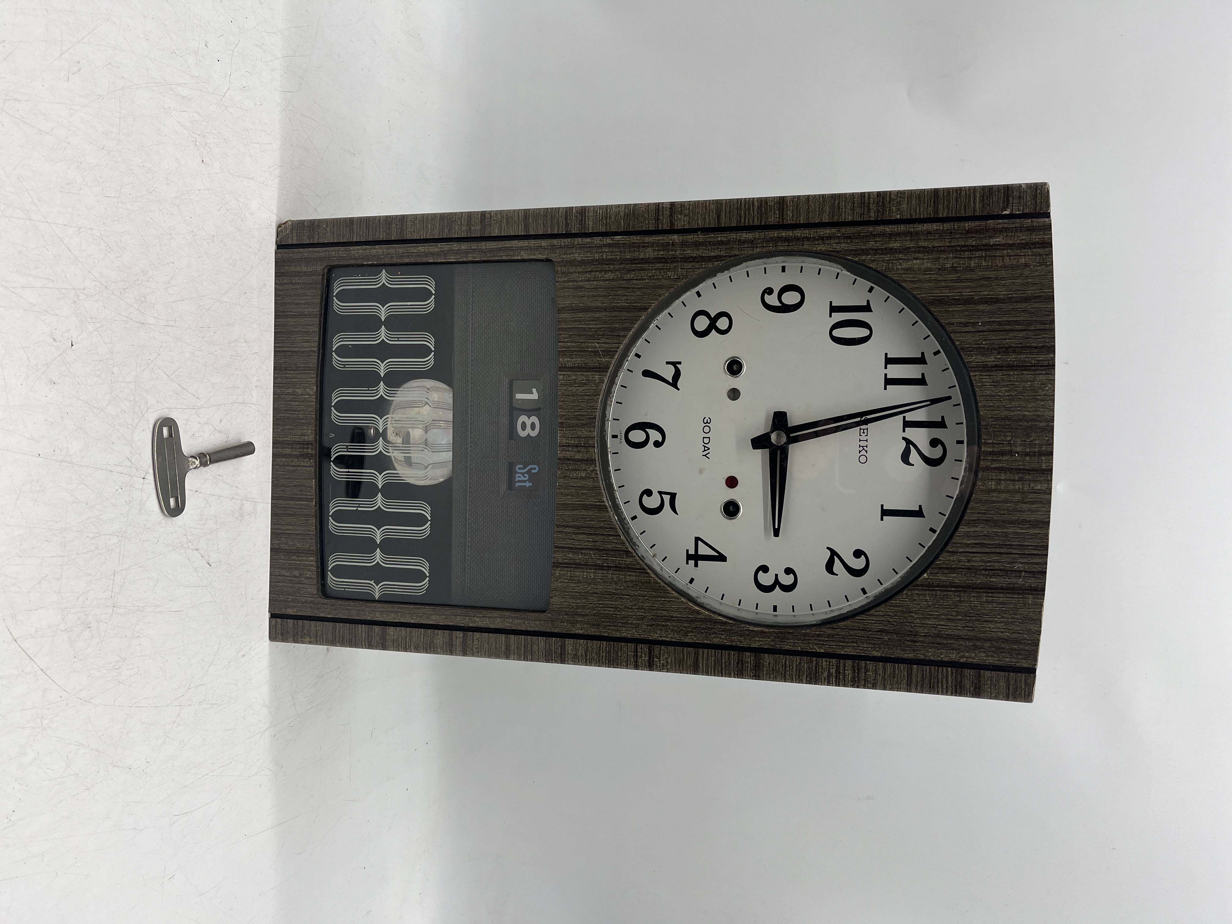 A mid-century Seiko 30-day wall clock with key. Height 43cm - Image 5 of 5