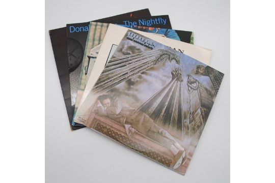 A collection of five 12" vinyl record albums by Steely Dan/Donald Fagen, comprising 'The Royal - Image 1 of 9