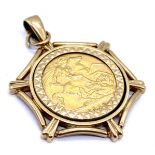 A George V 1912 half sovereign in loose 9ct gold mount total weight 8.3g