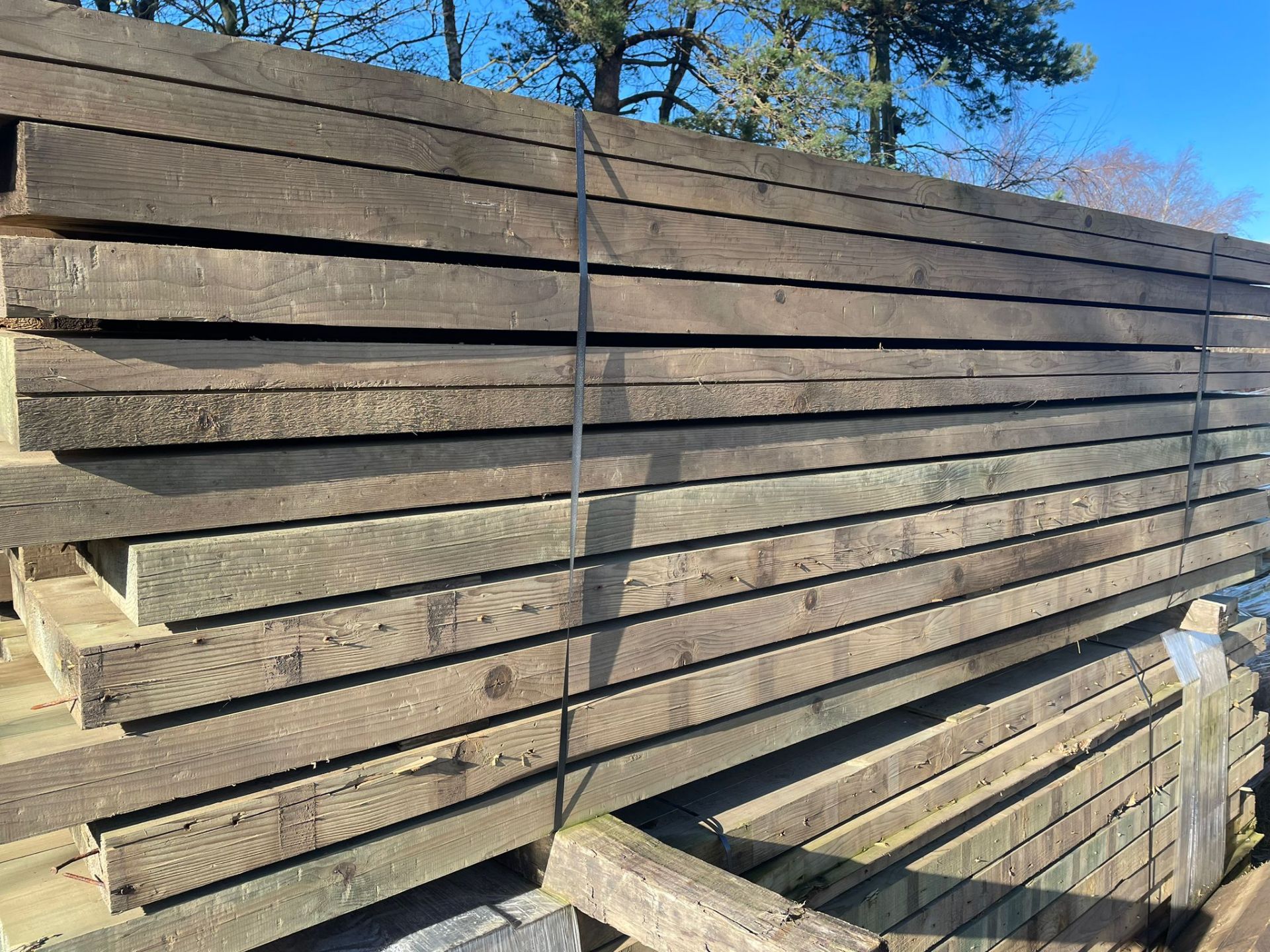 Wood Bundle of 30 3m long by 12" wide 3" thick treated joists - Image 2 of 3