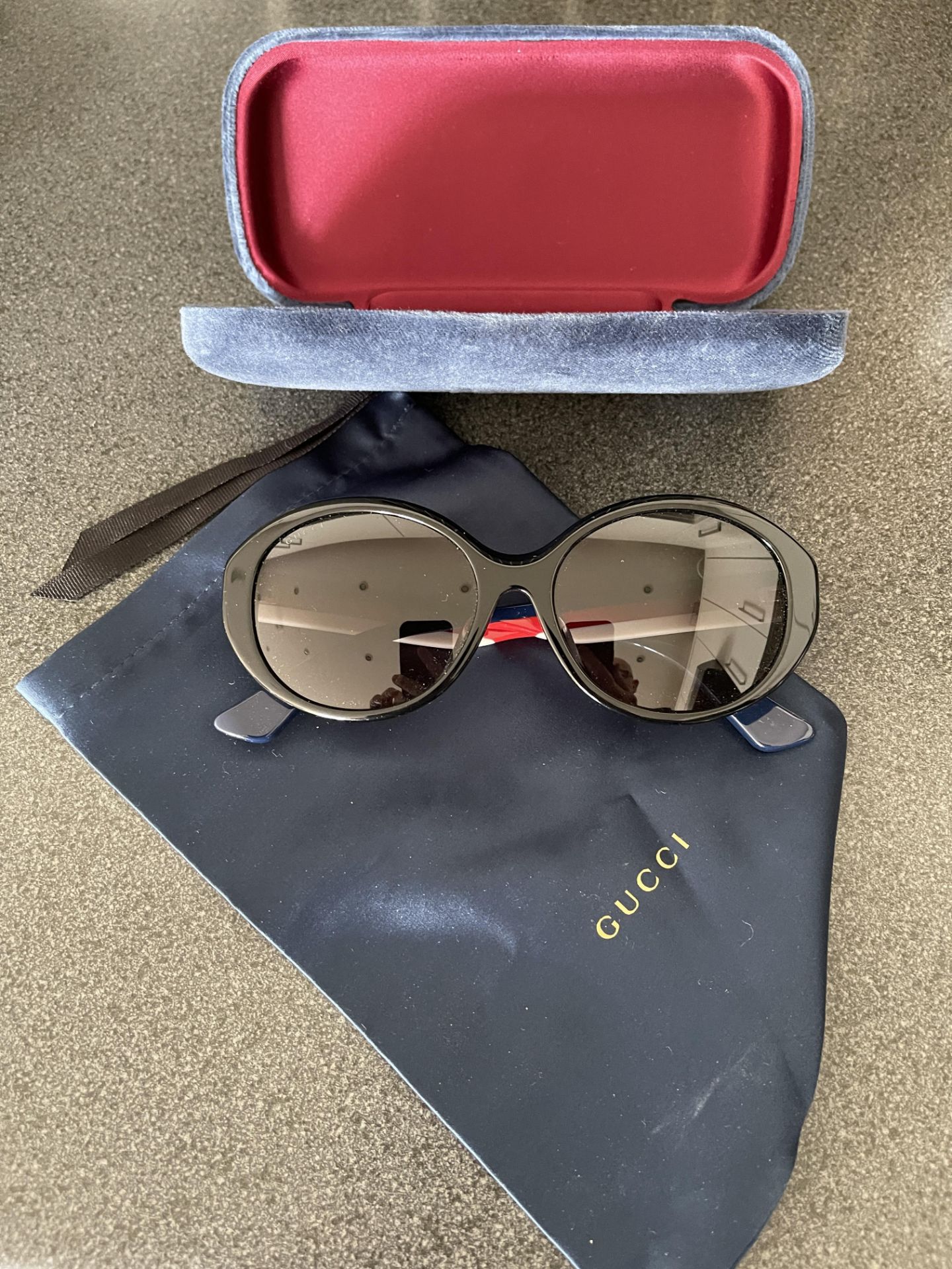 Gucci ladies sunglasses demon from a private jet charter. with case and cloth