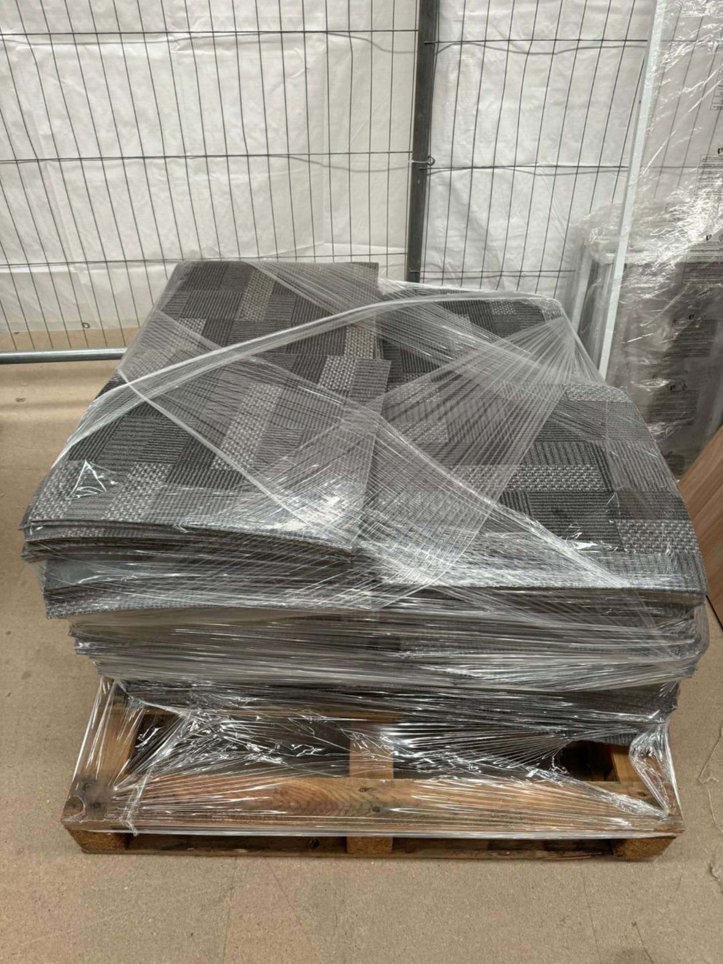 Pallet of grey office carpet tiles