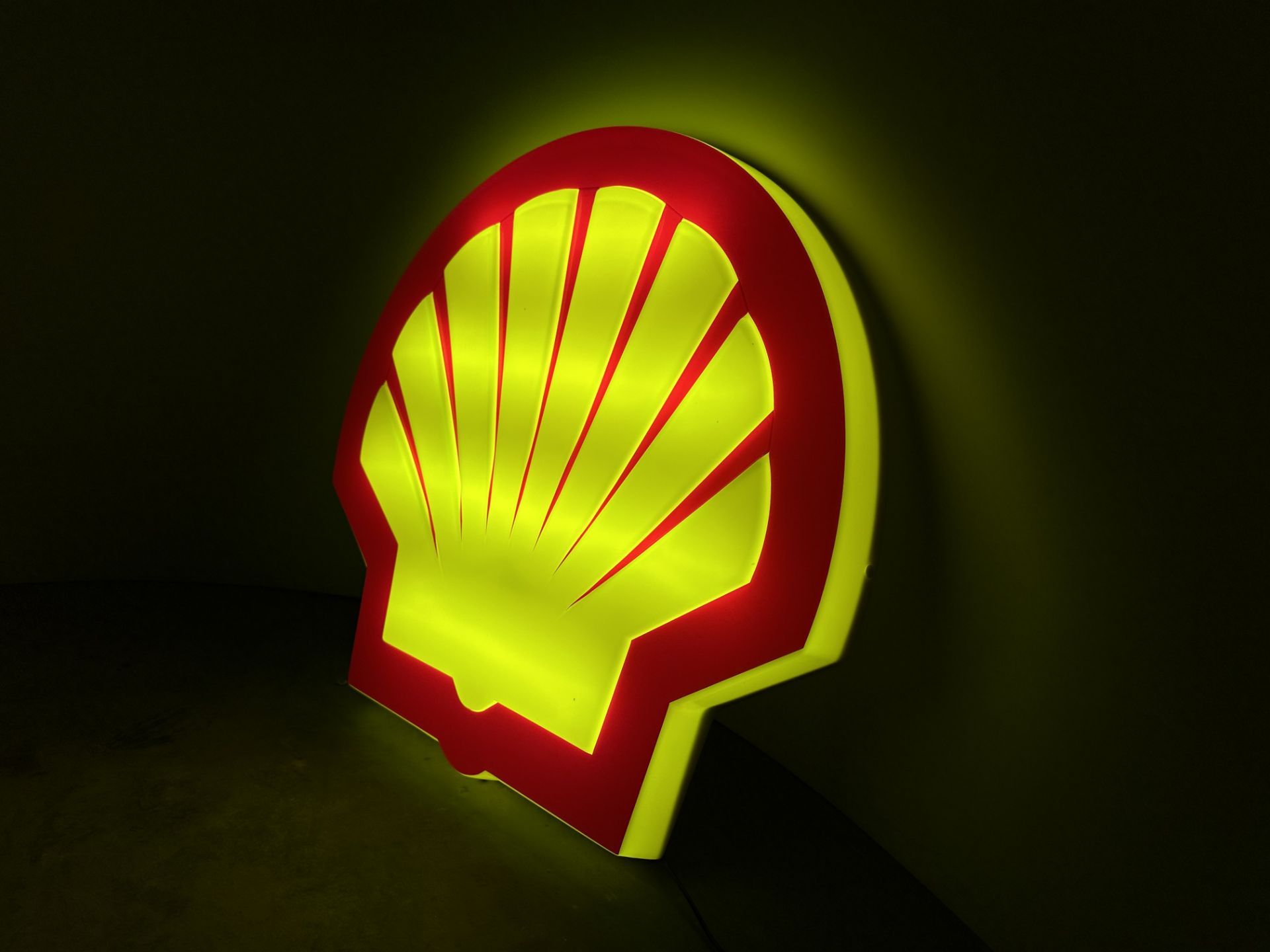 Shell illumination sign works in any country
