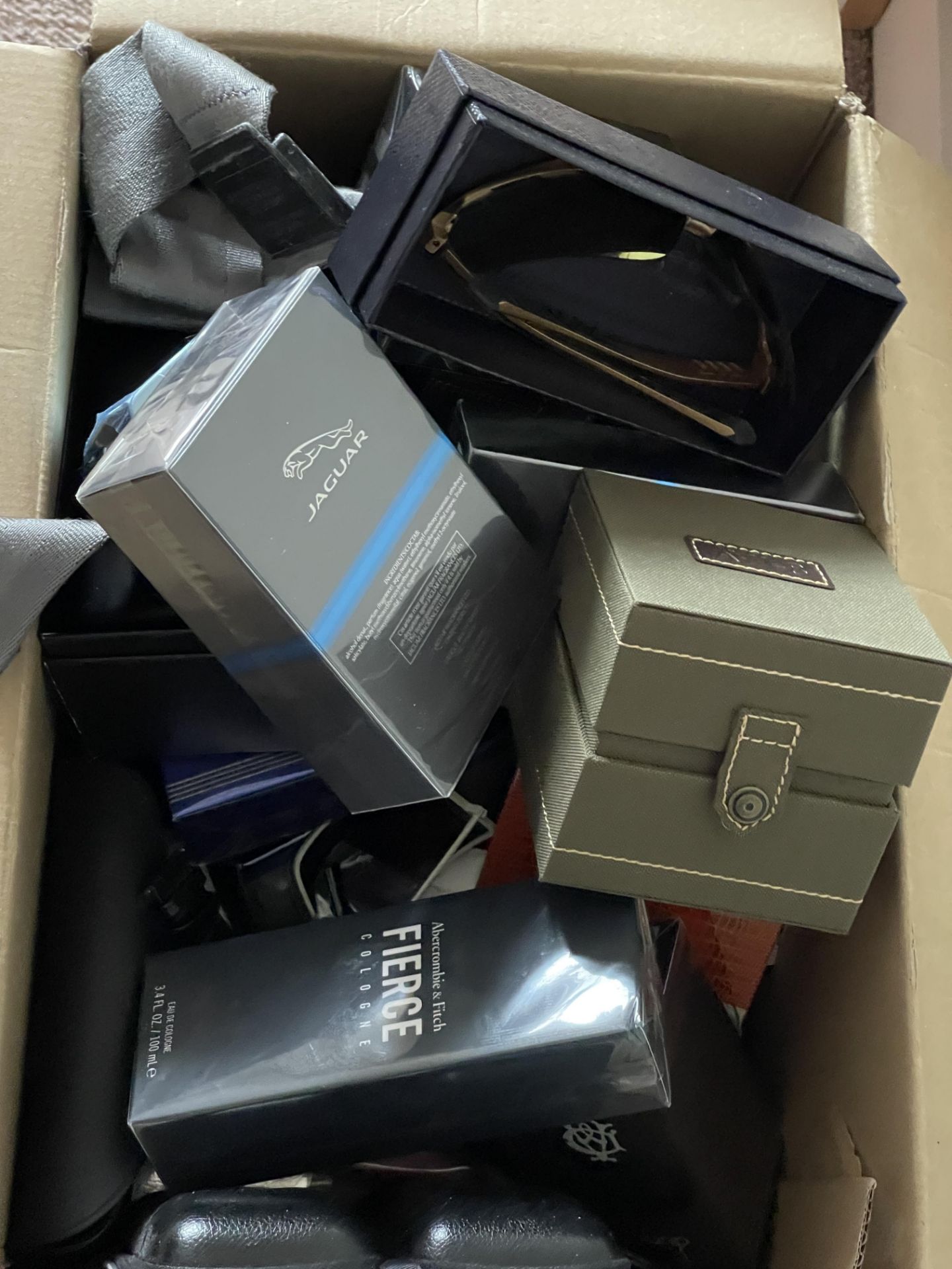 Aftershaves mystery box containing watches sunglasses ect worth - Image 14 of 31