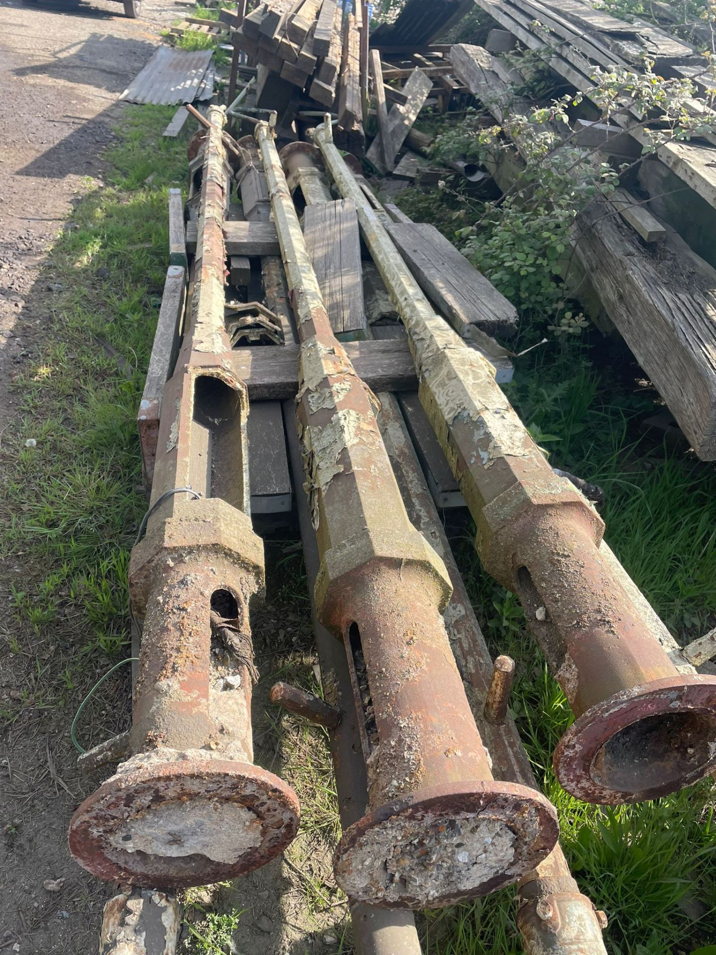 Set of three Victorian lamp posts ( laying down)