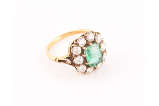 An 18ct yellow gold, diamond, and emerald ring, centred with a mixed emerald-cut emerald of - Image 4 of 6