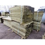 STACK OF 2 X LARGE PACKS OF TREATED FEATHER EDGE CLADDING TIMBER BOARDS: 1.2M LENGTH X 100MM WIDTH A