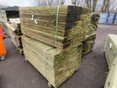 STACK OF 2 X LARGE PACKS OF TREATED FEATHER EDGE CLADDING TIMBER BOARDS: 1.5M LENGTH X 100MM WIDTH A