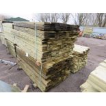 STACK OF 2 X LARGE PACKS OF TREATED FEATHER EDGE CLADDING TIMBER BOARDS: 1.8M LENGTH X 100MM WIDTH A