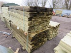 STACK OF 2 X LARGE PACKS OF TREATED FEATHER EDGE CLADDING TIMBER BOARDS: 1.8M LENGTH X 100MM WIDTH A