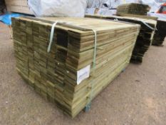 LARGE PACK OF TREATED FEATHER EDGE TIMBER BOARDS: 1.5M LENGTH X 100MM WIDTH APPROX.